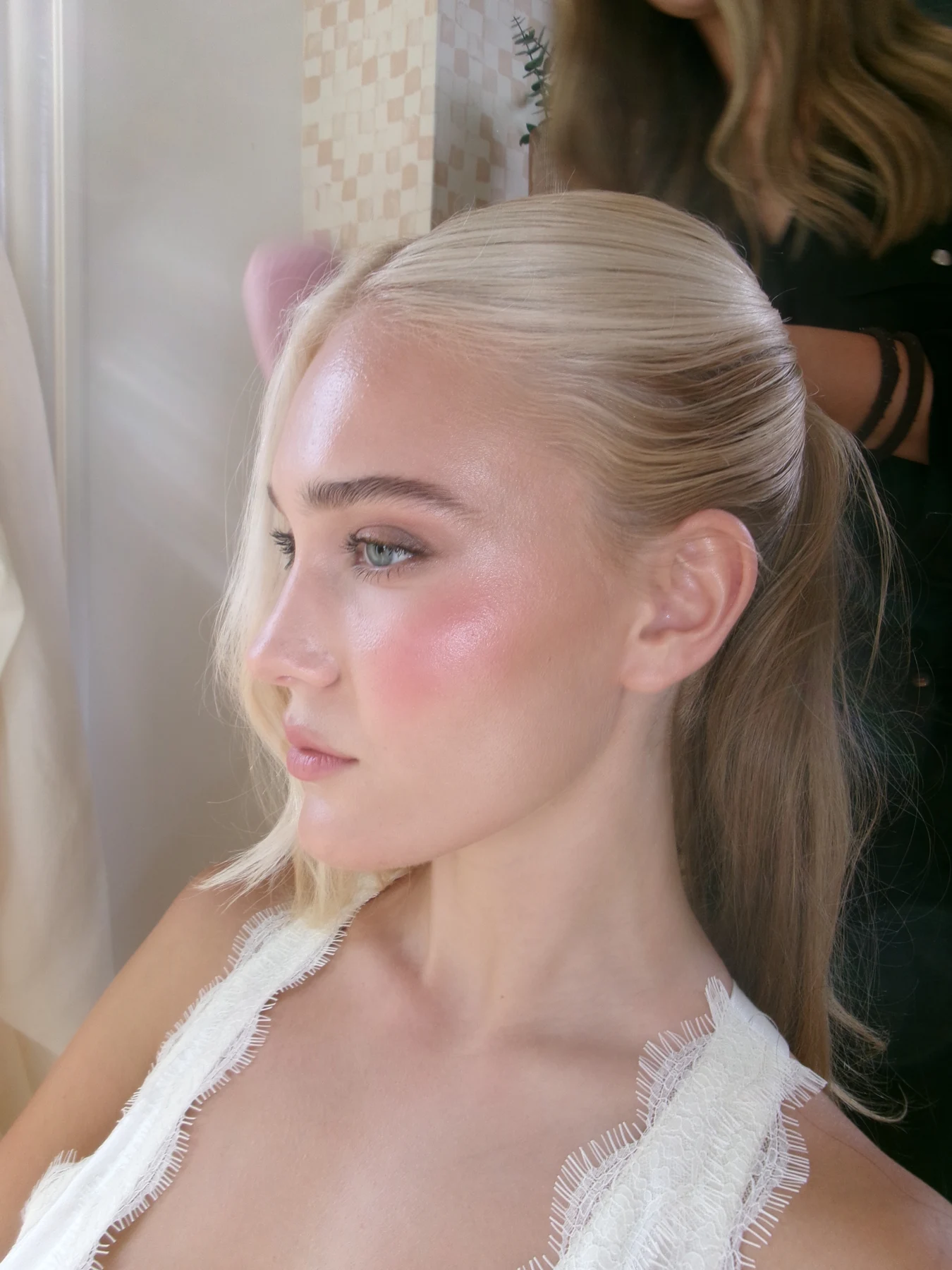 Polished makeup and hairstyling detail
